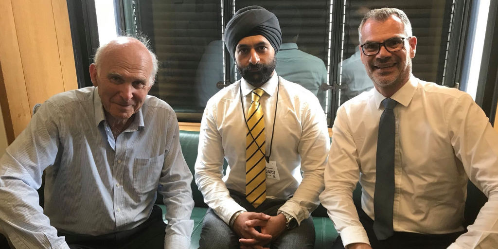 Deepak Singh Udassi with former leader of the Liberal Democrats Sir Vince Cable and FMB CEO Brain Berry